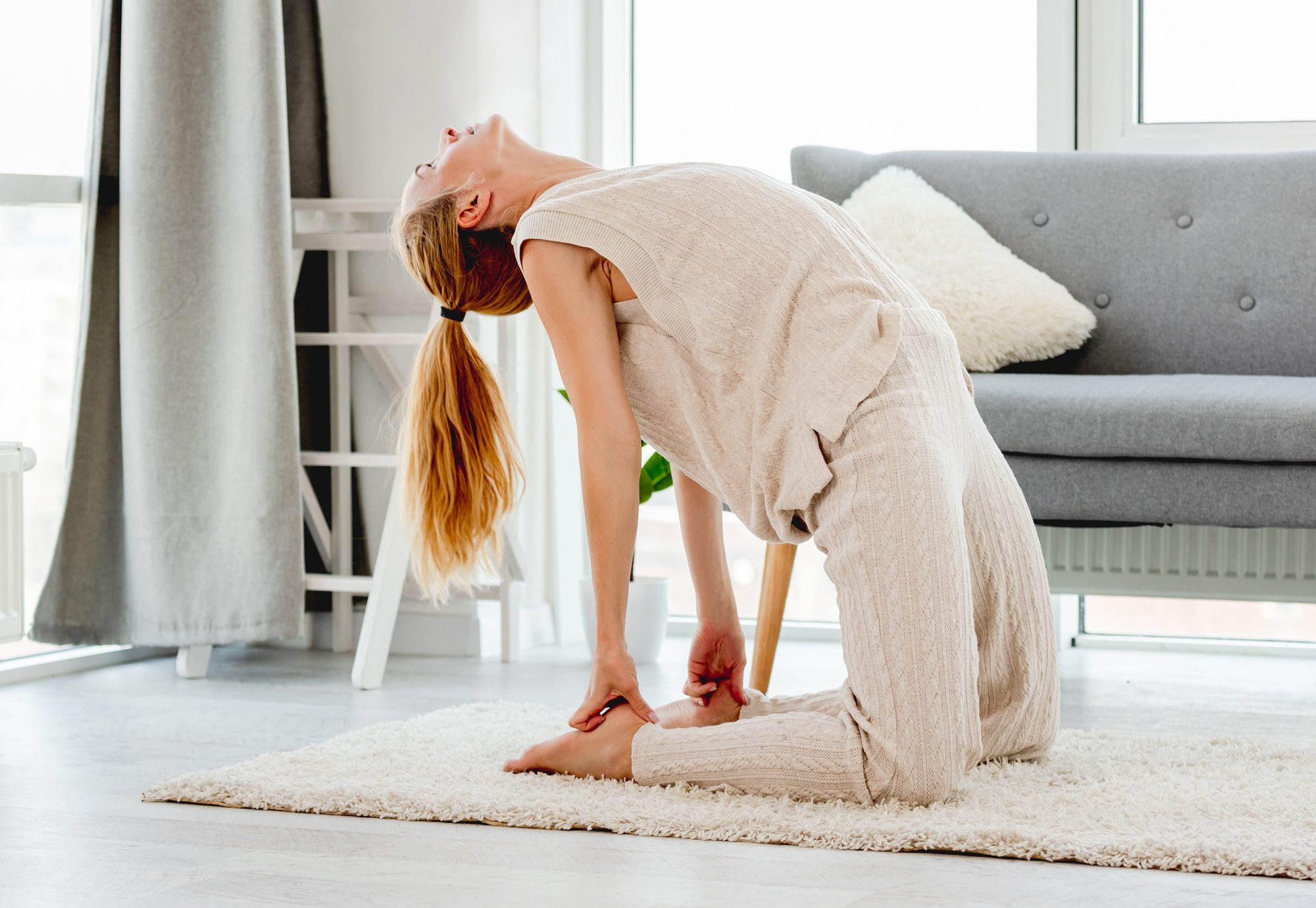 Blond girl home yoga workout